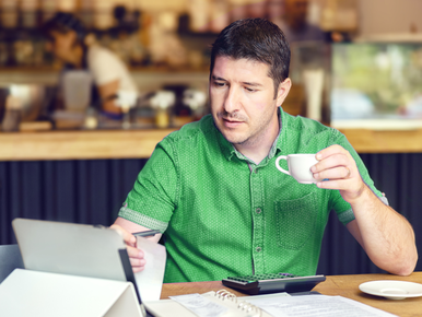 Business owner drinking coffee 772x579 .png