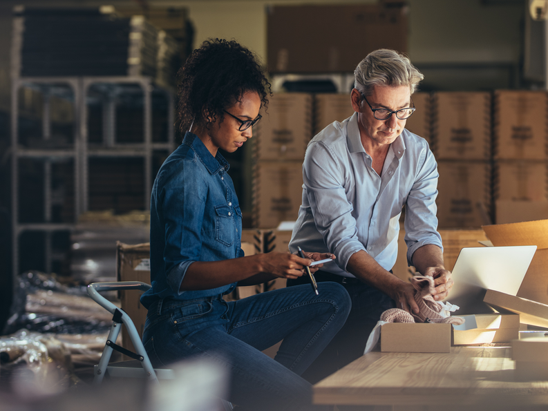 Business owners shipping products 1800x1350.png