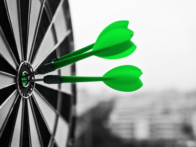 Dart board with green darts 1800x1350.jpg