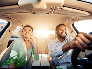 Happy couple driving 772x579.png