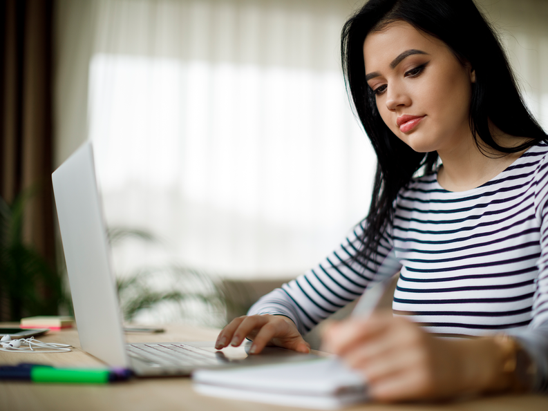 Lady working on her laptop 1800x1350.png